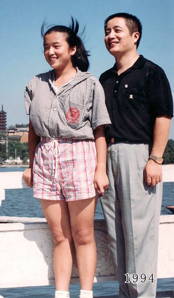 Une photo de famille émouvant d'un père avec sa fille en Chine.