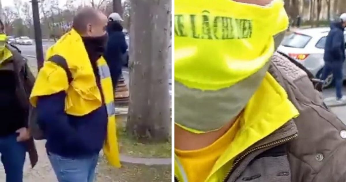 Trois personnes verbalisées pour porter un masque et un gilet jaune sur les champs élysées à Paris.