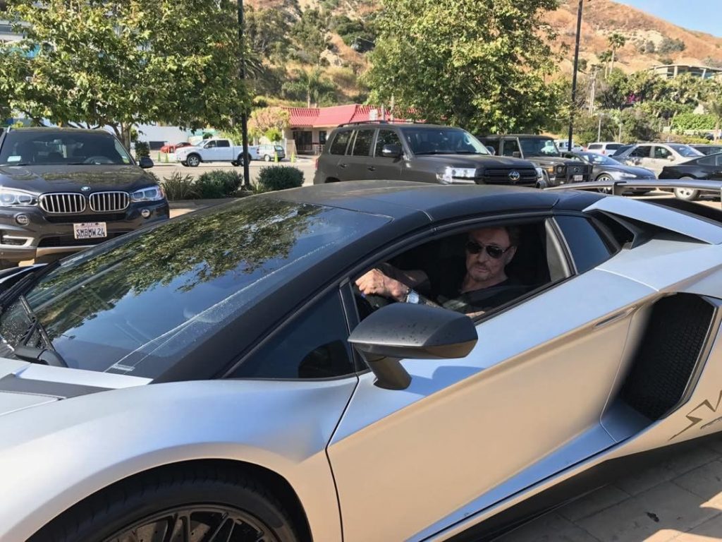 Le Taulier au volant d'une Lamborghini Aventador
