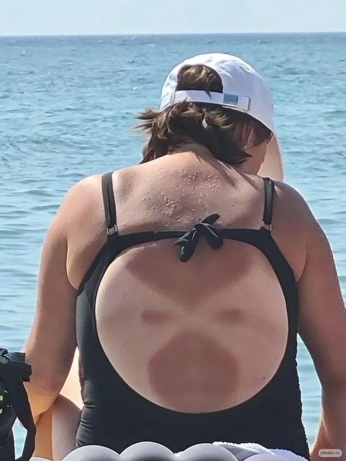 Un bronzage de super-héros à la plage